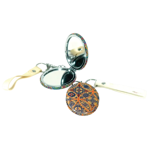 Travel friendly dual sided compact mirror by Aminsuk